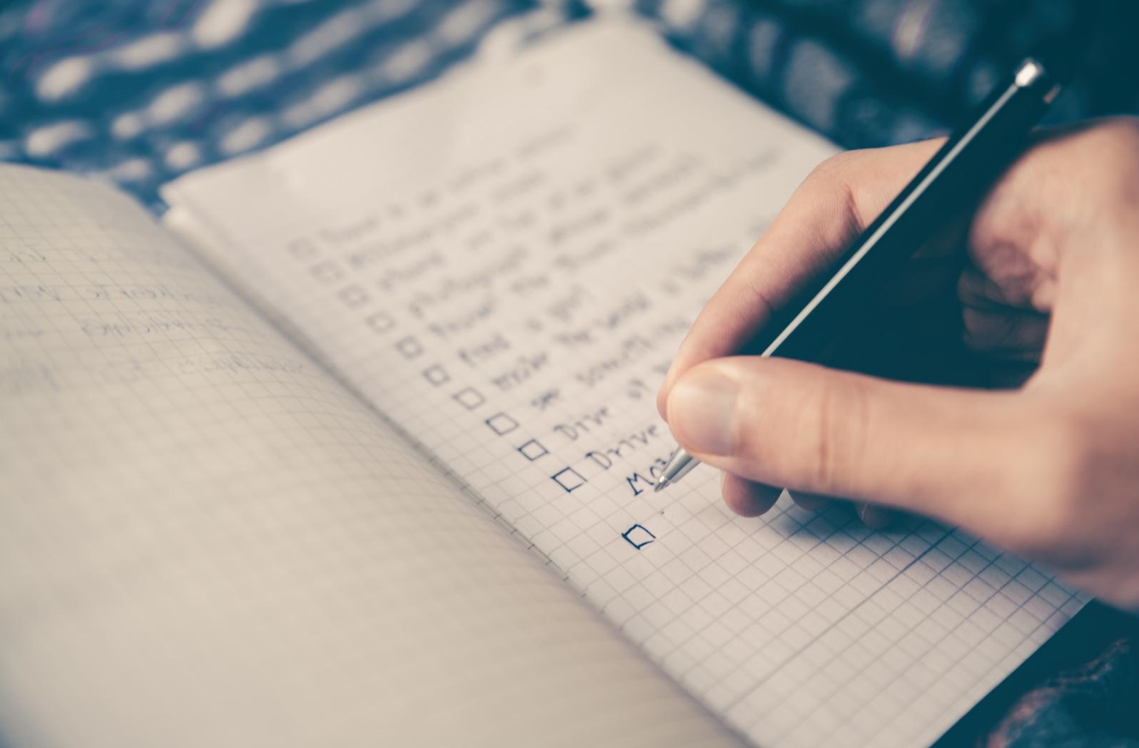Person writing in a journal